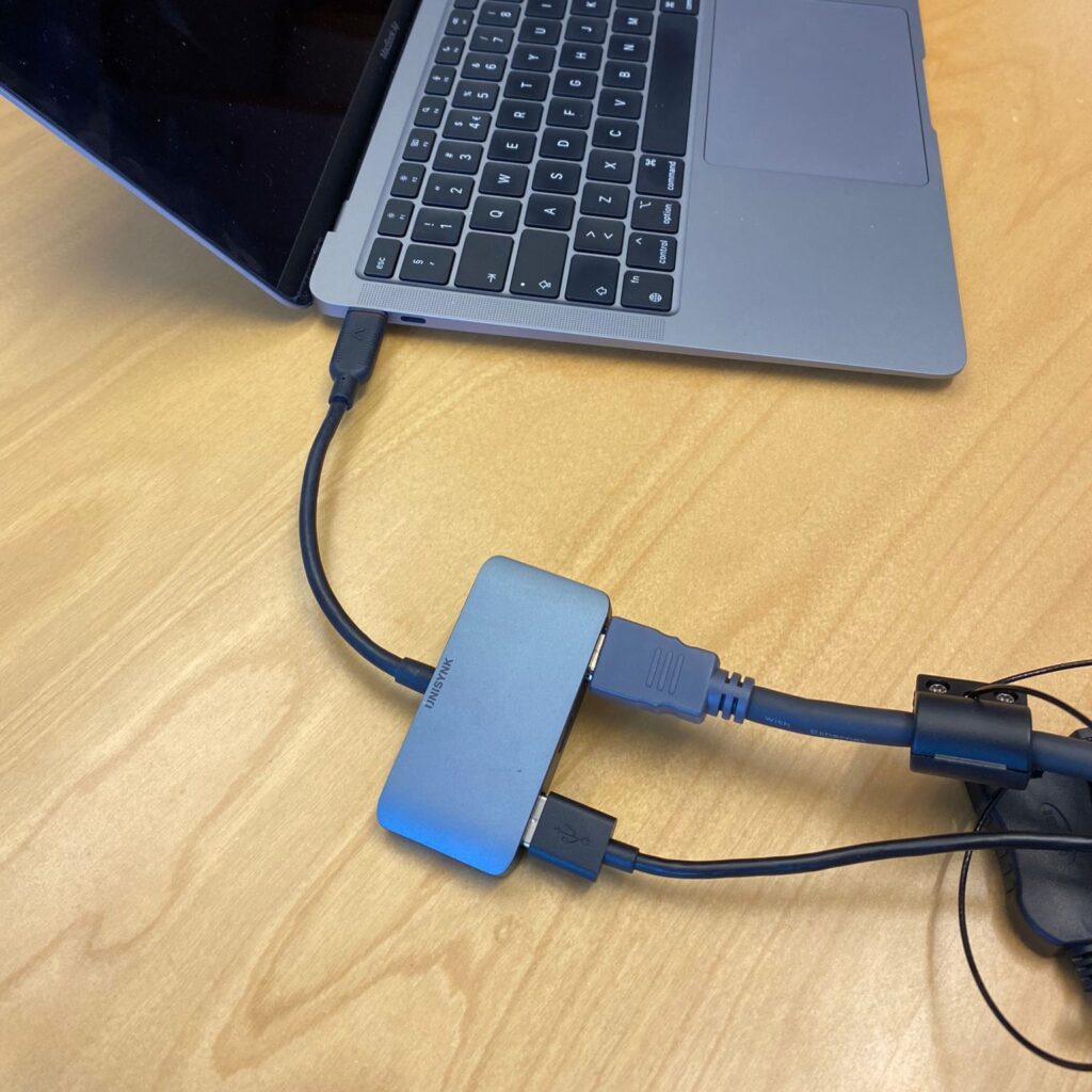HDMI cable connected to a laptop.