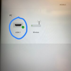 A blue circle around "HDMI 1" in the menu of the Lab Screen.