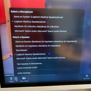 Showing where to select microphone and speakers in the Zoom app.