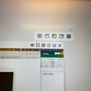 Showing where to touch to make it full screen.